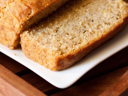 closeup shot of banana bread slices on white tray
