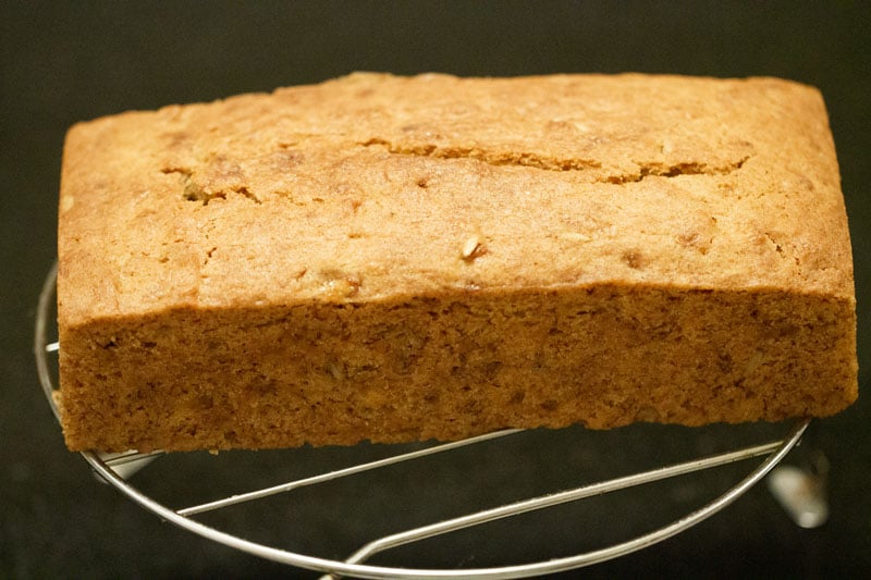 Top shot of fully baked vegan banana bread on cooling rack