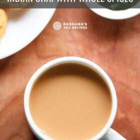 overhead shot of masala chai in a white cup on brown board with text layovers