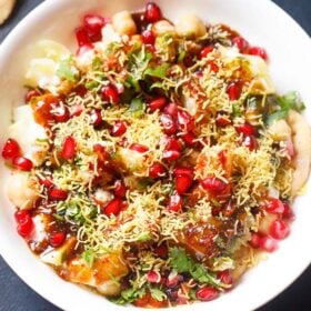 overhead shot of papdi chaat in a white bowl