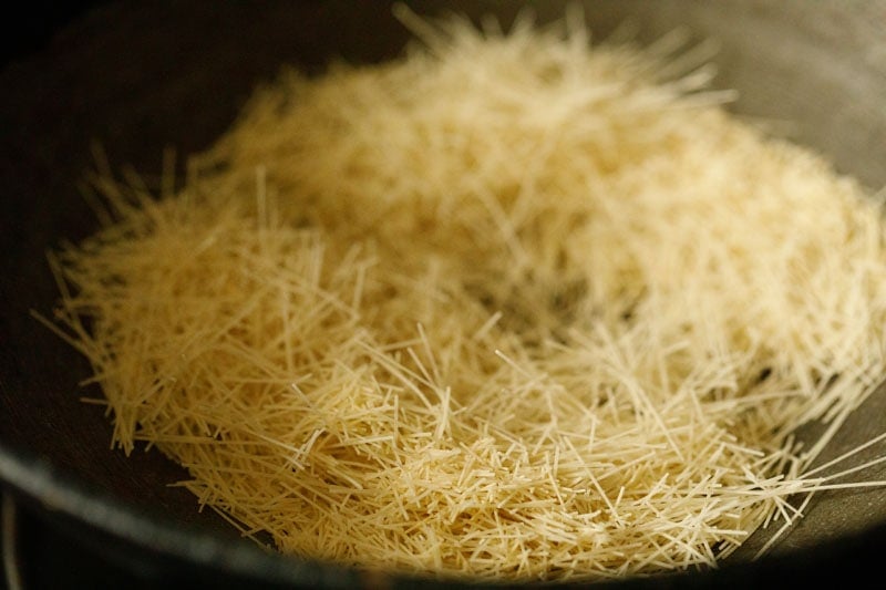 dry toasting vermicelli in a hot pan for making sheer khurma