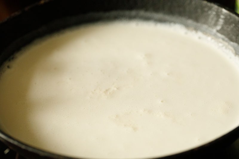 milk bubbling around edges of pan and lightly simmering
