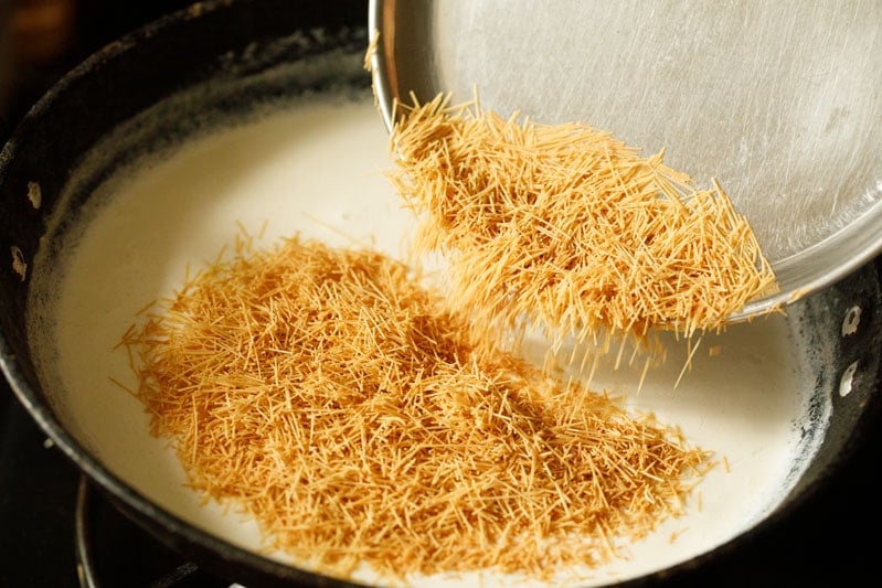 toasted noodles added to milk for making sheer korma