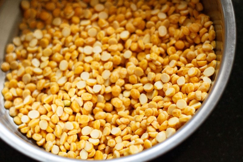 chana dal, bengal gram in a steel bowl