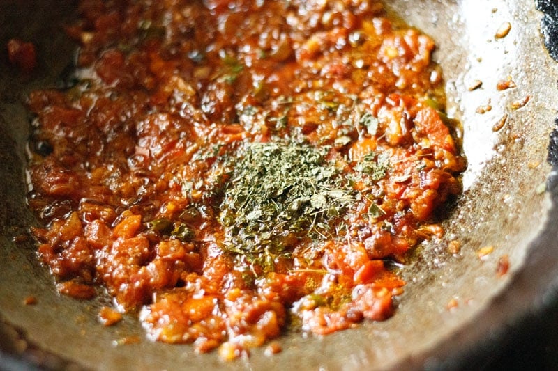 crushed dried fenugreek leaves on top of masala mixture