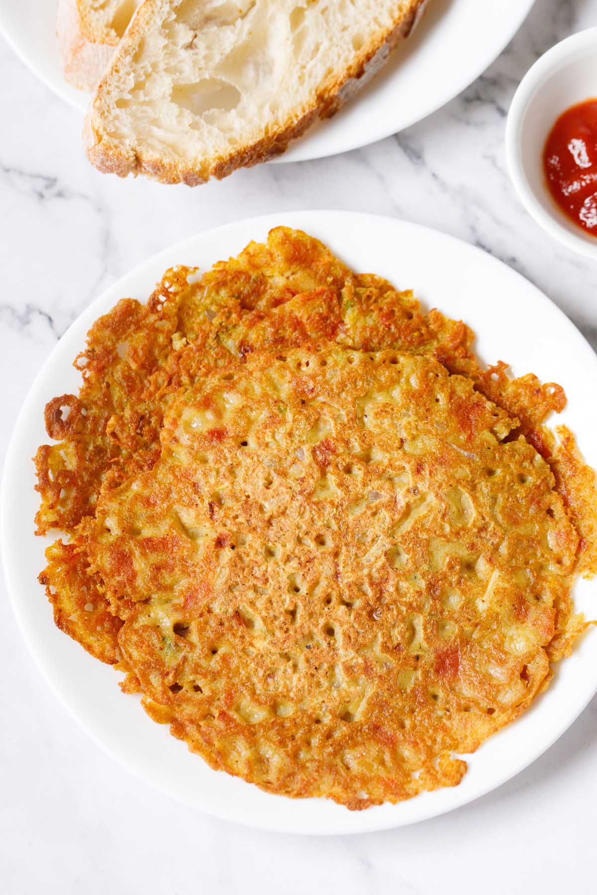 tomato omelette on white plate