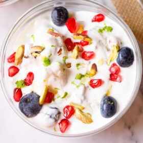 closeup shot of fruit cream in a glass bowl