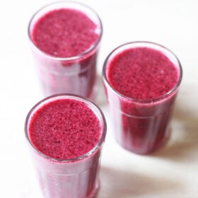 blueberry juice served in glasses.