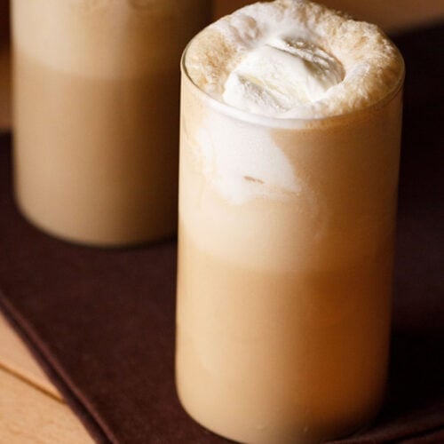 2 coffee milkshakes with ice cream in a glass