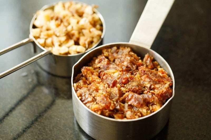 chopped dates and walnuts in a measuring bowl.