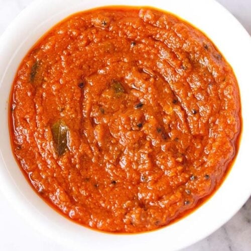 tomato pickle in a white bowl.