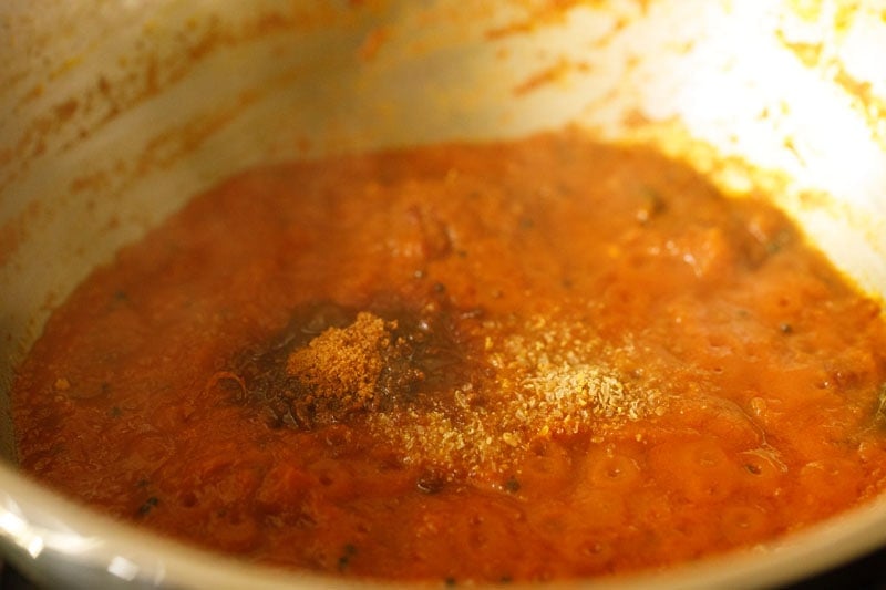 jaggery and ground fenugreek in tomato thokku mixture.