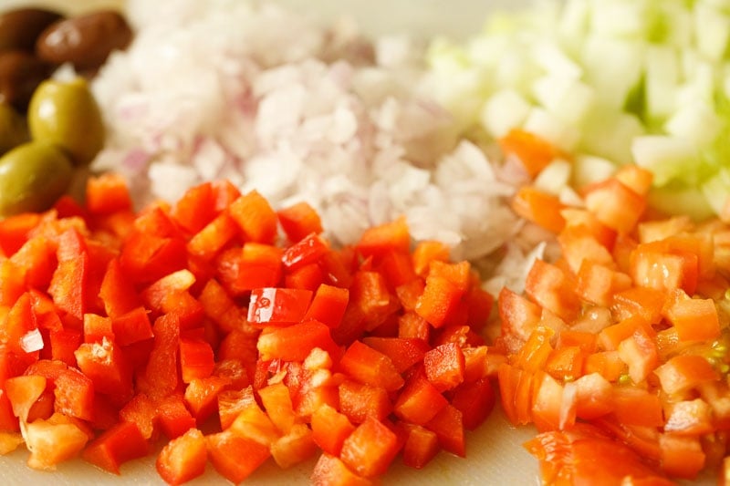 chopped vegetables for mediterranean chickpea salad. 