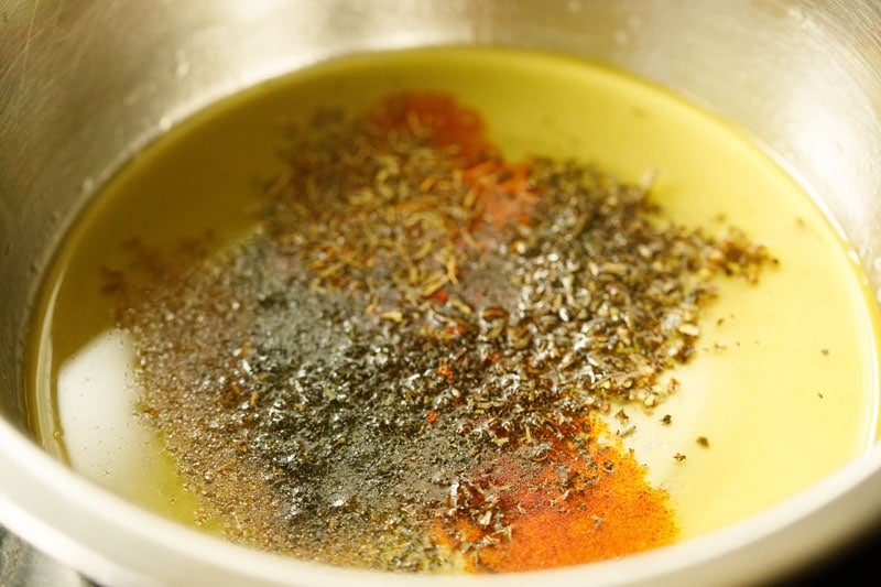dried herbs added to the olive oil mixture. 