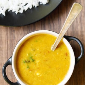 masoor dal in a bowl with spoon.