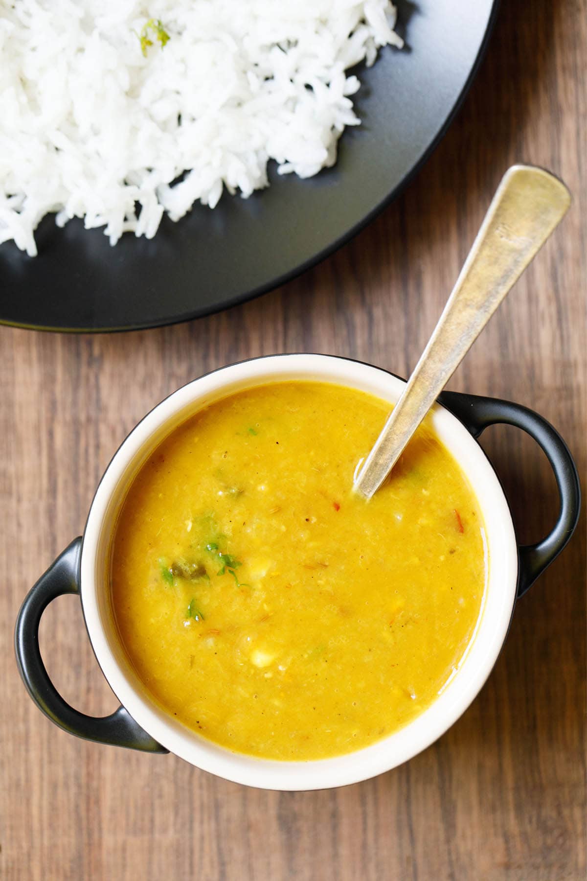 masoor dal in a bowl with spoon.