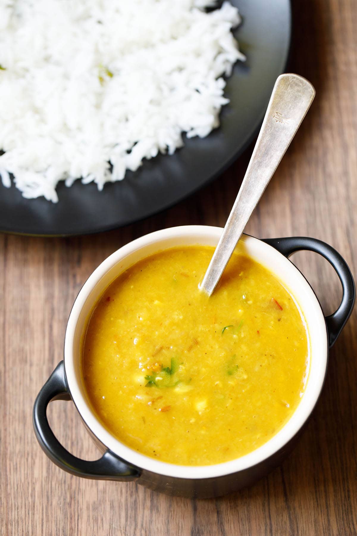 red lentils in a bowl with spoon.