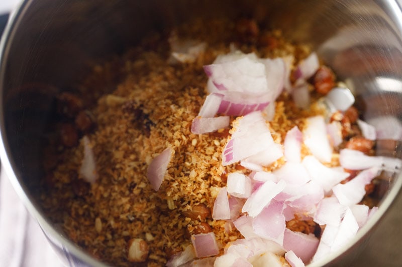 coconut mixture and chopped onions in a blender.