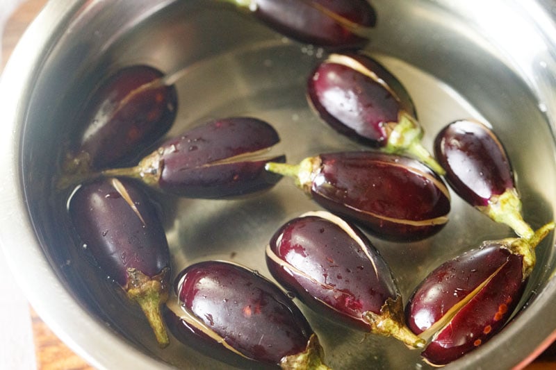 soaking cut eggplants in water.