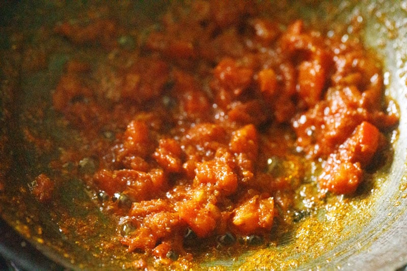ground spices mixed with sauteed onions and tomatoes.