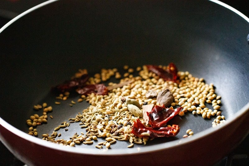 dry roasting spices in a pan.