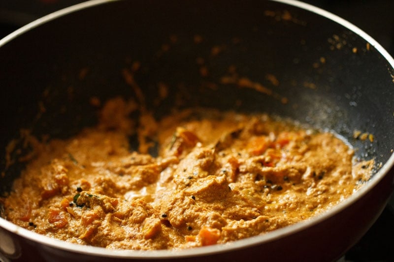 masala paste mixed well with the onion-tomato mixture. 