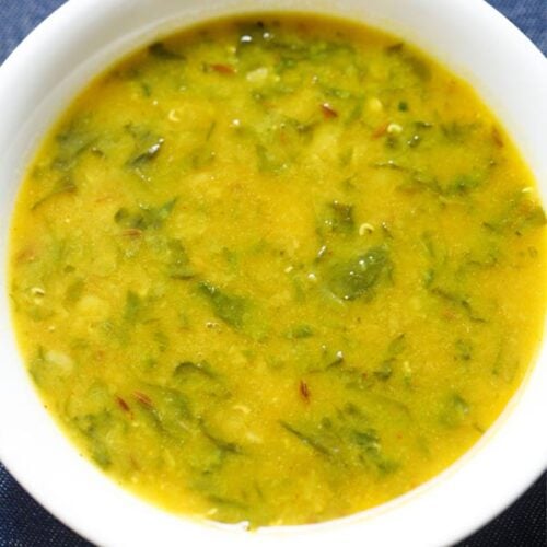 dal palak or spinach dal in a white bowl.
