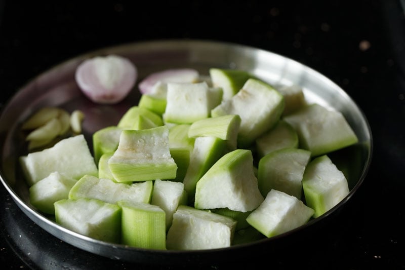 chopped bottle gourd on a plate.