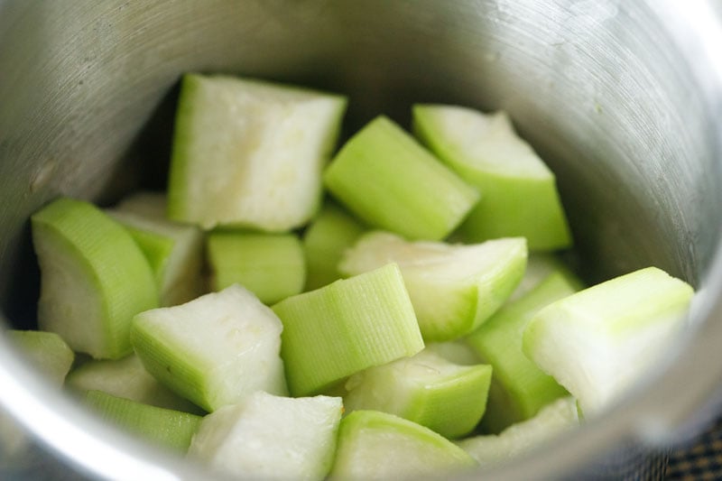 peeled and chopped bottle gourd in pressure cooker.