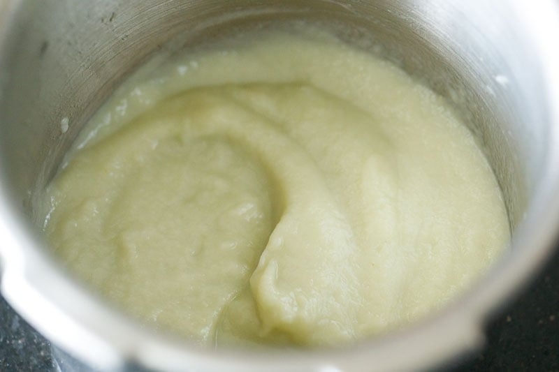 pureed and blended bottle gourd in cooker.