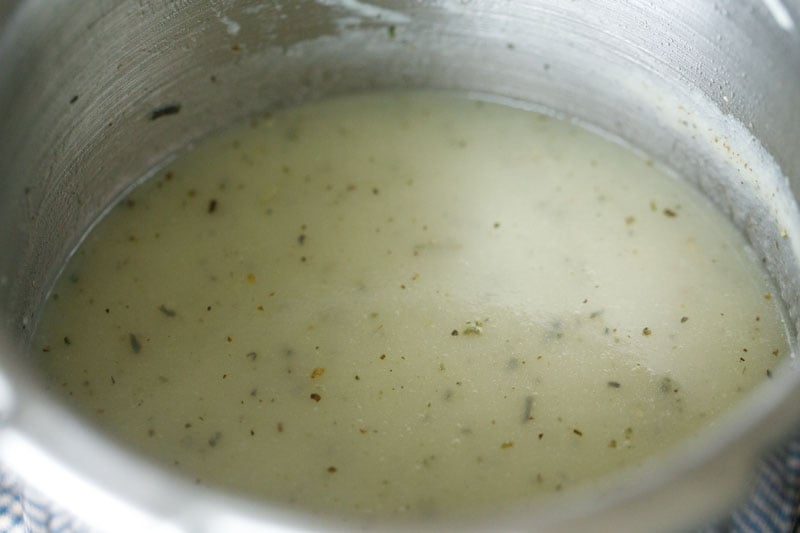 simmering lauki soup in cooker.