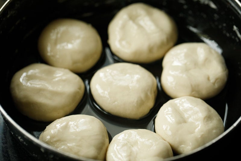 dough balls covered with oil for making kerala paratha.