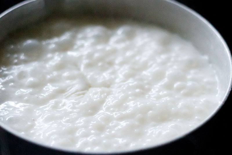 Simmering and bubbling creamy sabudana kheer.