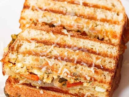 Paneer sandwich on a white plate.