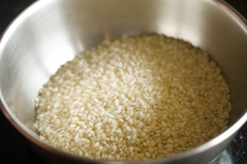 rice added to another bowl for making paddu. 