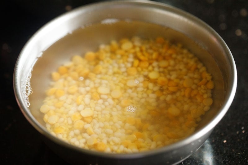 lentils soaked in water for making paddu. 