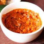 tomato chutney in a white bowl.