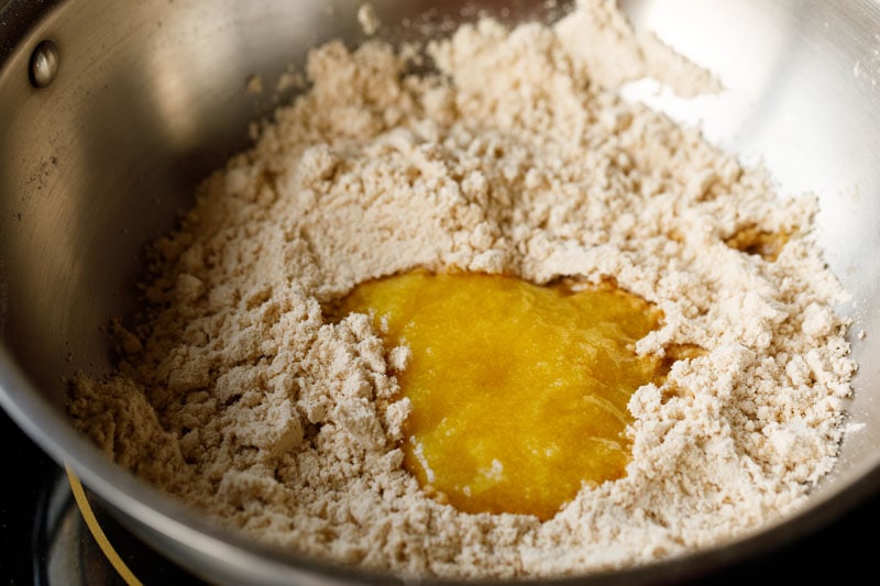 ghee added to roasted flour. 