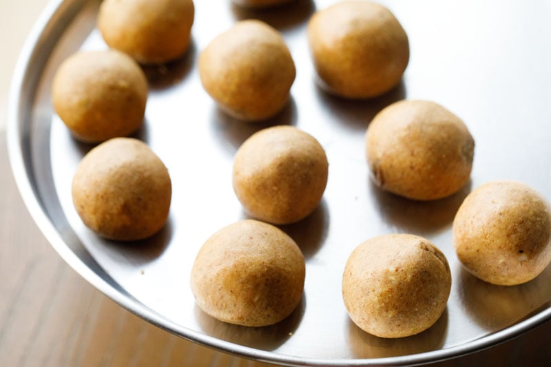 portions of mixture shaped into pinni and placed on a steel plate. 