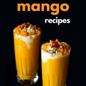 two tall glasses of thick creamy mango shake topped with mango cubes, glazed cherries, nuts on a black background with text layovers.