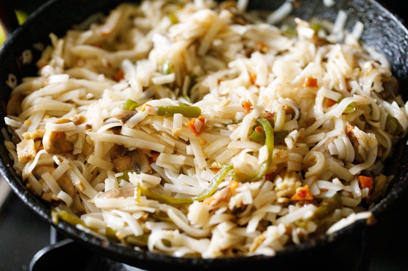 rice noodles mixed with sauce.