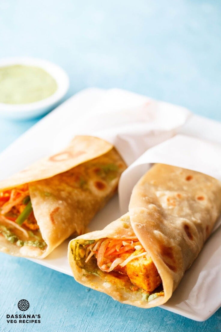 My Paneer Roll recipe is one of the best kathi rolls (or frankies) that I have ever made; I can honestly say it beats the ones that street vendors in Calcutta sell! Paneer tikka, green chutney, and a mixed veggie salad are wrapped in a whole wheat roti for a healthy, tasty and portable lunch.