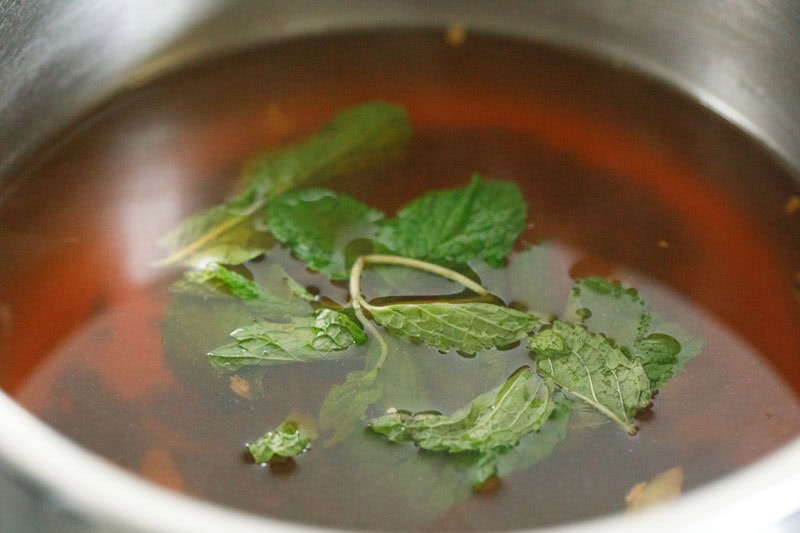 mint leaves added to sulaimani chai. 