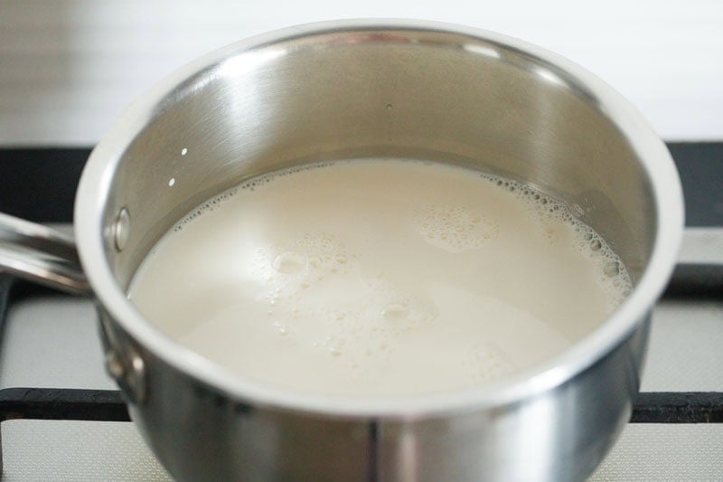 full-fat milk added in a saucepan. 