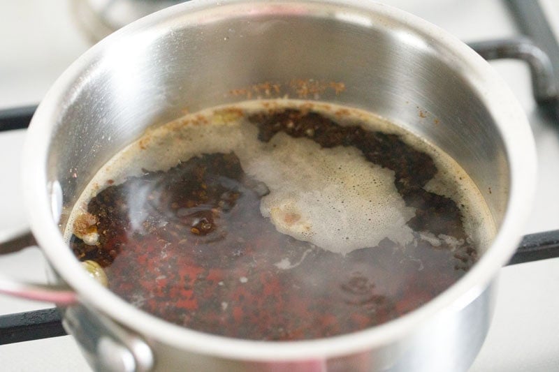 simmering irani chai decoction. 