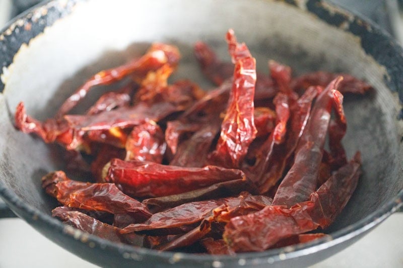 dried red chilies added to hot pan.