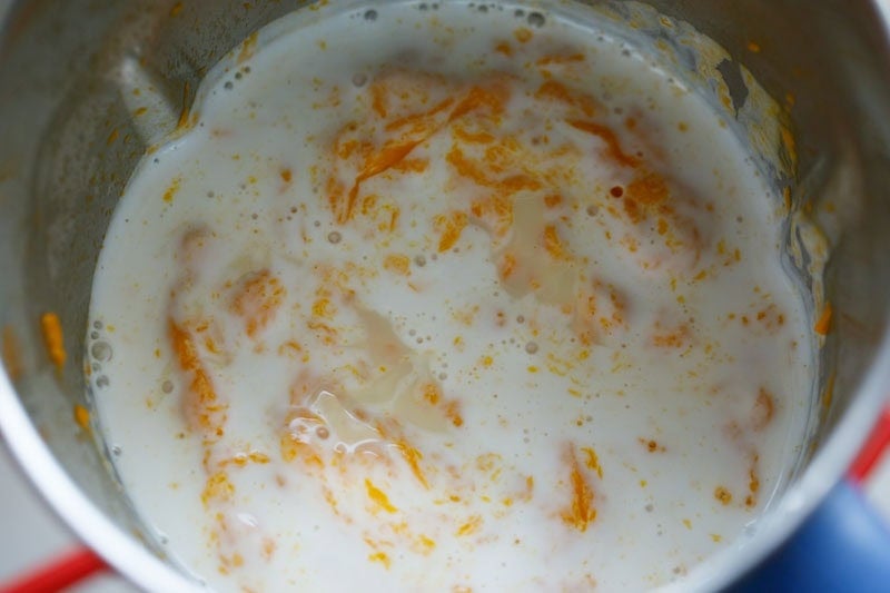 condensed milk and coconut milk added to mango puree.