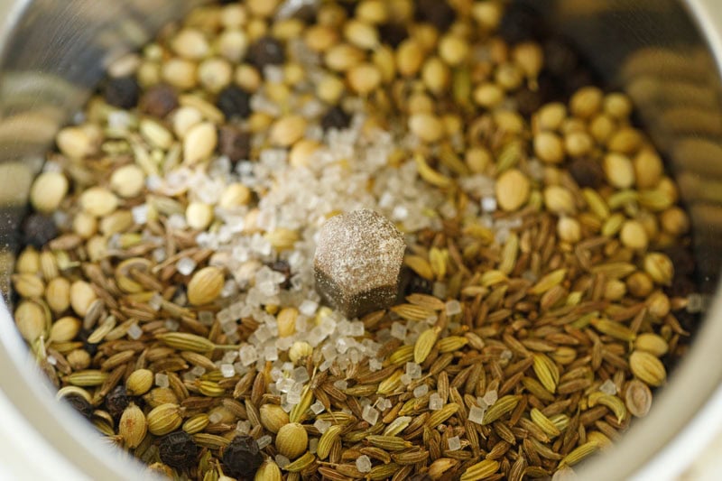 roasted spices and sugar added to mixer grinder.