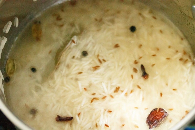 water added to rice and spices.