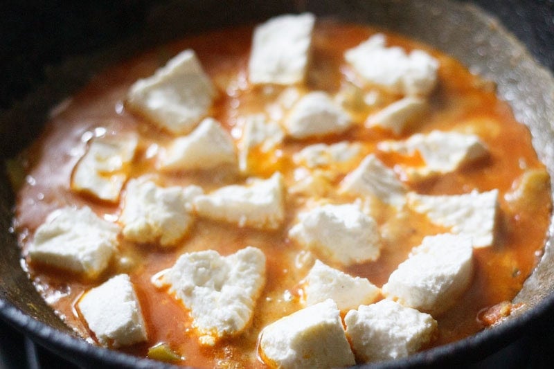 chopped paneer added to capsicum curry.